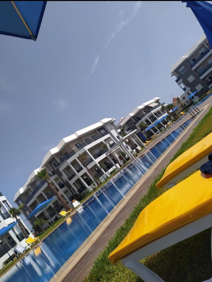 Bel Appartement A Amwaj Beach And Resorts Casablanca Bagian luar foto